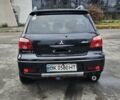 Чорний Міцубісі Аутлендер, об'ємом двигуна 2 л та пробігом 290 тис. км за 5000 $, фото 7 на Automoto.ua