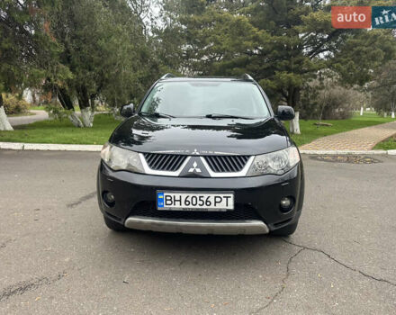 Чорний Міцубісі Аутлендер, об'ємом двигуна 2.4 л та пробігом 230 тис. км за 8300 $, фото 1 на Automoto.ua