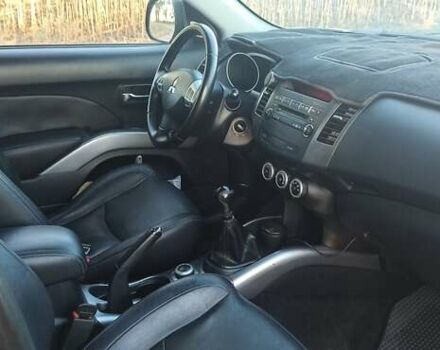 Черный Мицубиси Аутлендер, объемом двигателя 1.97 л и пробегом 244 тыс. км за 9000 $, фото 25 на Automoto.ua