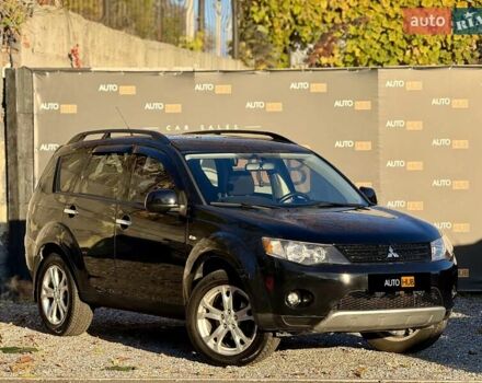 Черный Мицубиси Аутлендер, объемом двигателя 3 л и пробегом 198 тыс. км за 9500 $, фото 1 на Automoto.ua