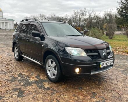 Черный Мицубиси Аутлендер, объемом двигателя 2.4 л и пробегом 213 тыс. км за 6850 $, фото 3 на Automoto.ua