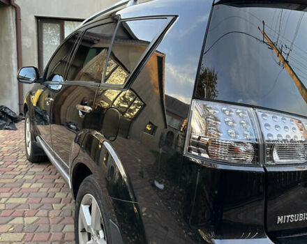 Чорний Міцубісі Аутлендер, об'ємом двигуна 3 л та пробігом 238 тис. км за 11200 $, фото 7 на Automoto.ua