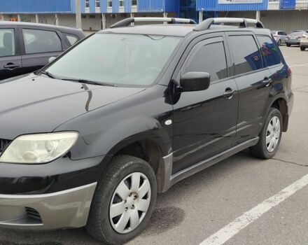 Чорний Міцубісі Аутлендер, об'ємом двигуна 2 л та пробігом 175 тис. км за 7800 $, фото 1 на Automoto.ua