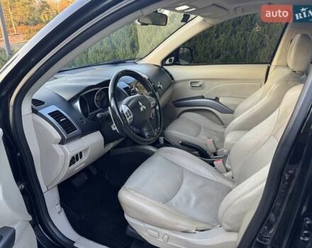 Черный Мицубиси Аутлендер, объемом двигателя 3 л и пробегом 205 тыс. км за 11300 $, фото 10 на Automoto.ua