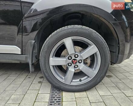 Черный Мицубиси Аутлендер, объемом двигателя 3 л и пробегом 238 тыс. км за 10800 $, фото 14 на Automoto.ua