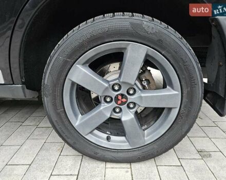 Черный Мицубиси Аутлендер, объемом двигателя 3 л и пробегом 238 тыс. км за 10800 $, фото 12 на Automoto.ua