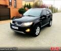 Черный Мицубиси Аутлендер, объемом двигателя 3 л и пробегом 230 тыс. км за 8999 $, фото 1 на Automoto.ua