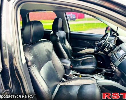 Черный Мицубиси Аутлендер, объемом двигателя 3 л и пробегом 200 тыс. км за 9799 $, фото 12 на Automoto.ua