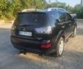 Черный Мицубиси Аутлендер, объемом двигателя 3 л и пробегом 250 тыс. км за 9700 $, фото 2 на Automoto.ua