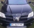 Міцубісі Аутлендер 2007 у Львові на Automoto.ua Чорний Міцубісі Аутлендер, об'ємом двигуна 2.4 л та пробігом 295 тис. км за 6800 $, фото 13 на Automoto.ua