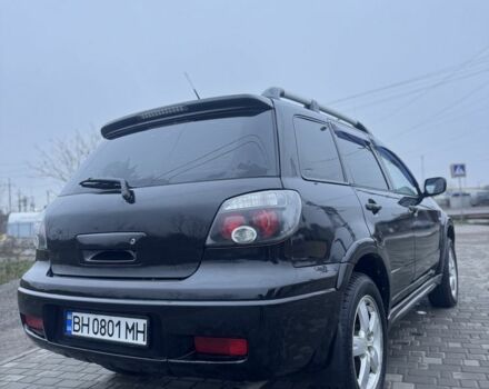 Чорний Міцубісі Аутлендер, об'ємом двигуна 2.4 л та пробігом 202 тис. км за 5800 $, фото 7 на Automoto.ua