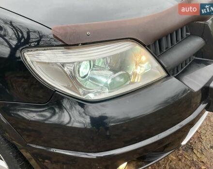 Чорний Міцубісі Аутлендер, об'ємом двигуна 2.4 л та пробігом 213 тис. км за 6850 $, фото 12 на Automoto.ua