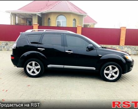 Черный Мицубиси Аутлендер, объемом двигателя 3 л и пробегом 230 тыс. км за 8999 $, фото 6 на Automoto.ua