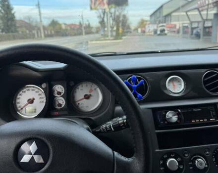 Чорний Міцубісі Аутлендер, об'ємом двигуна 2 л та пробігом 280 тис. км за 7500 $, фото 8 на Automoto.ua