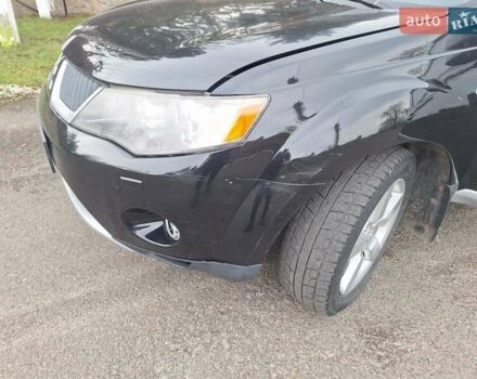 Черный Мицубиси Аутлендер, объемом двигателя 3 л и пробегом 220 тыс. км за 9000 $, фото 3 на Automoto.ua