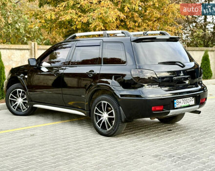 Міцубісі Аутлендер 2007 у Одесі на Automoto.ua Чорний Міцубісі Аутлендер, об'ємом двигуна 2.4 л та пробігом 201 тис. км за 7700 $, фото 21 на Automoto.ua