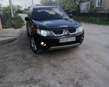 Черный Мицубиси Аутлендер, объемом двигателя 3 л и пробегом 200 тыс. км за 7999 $, фото 3 на Automoto.ua