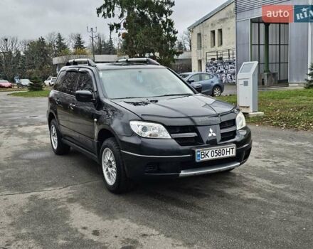 Черный Мицубиси Аутлендер, объемом двигателя 2 л и пробегом 200 тыс. км за 4900 $, фото 9 на Automoto.ua