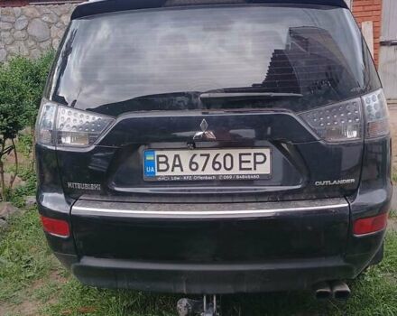 Черный Мицубиси Аутлендер, объемом двигателя 1.97 л и пробегом 218 тыс. км за 10500 $, фото 3 на Automoto.ua