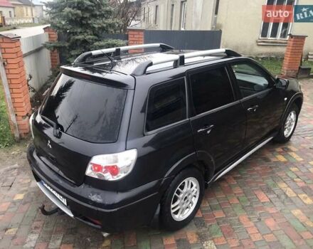 Черный Мицубиси Аутлендер, объемом двигателя 2 л и пробегом 284 тыс. км за 4999 $, фото 14 на Automoto.ua