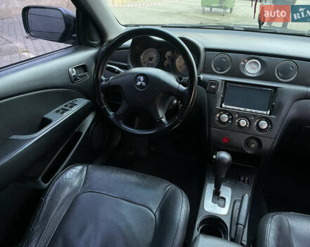 Черный Мицубиси Аутлендер, объемом двигателя 2.4 л и пробегом 248 тыс. км за 7300 $, фото 16 на Automoto.ua