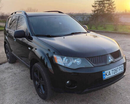 Черный Мицубиси Аутлендер, объемом двигателя 3 л и пробегом 225 тыс. км за 9200 $, фото 2 на Automoto.ua