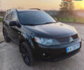 Черный Мицубиси Аутлендер, объемом двигателя 3 л и пробегом 225 тыс. км за 9200 $, фото 2 на Automoto.ua