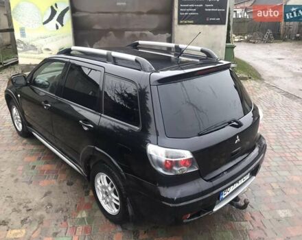 Черный Мицубиси Аутлендер, объемом двигателя 2 л и пробегом 284 тыс. км за 4500 $, фото 11 на Automoto.ua