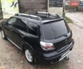Черный Мицубиси Аутлендер, объемом двигателя 2 л и пробегом 284 тыс. км за 4999 $, фото 12 на Automoto.ua