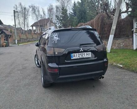 Черный Мицубиси Аутлендер, объемом двигателя 3 л и пробегом 220 тыс. км за 9000 $, фото 6 на Automoto.ua