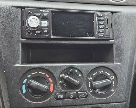 Чорний Міцубісі Аутлендер, об'ємом двигуна 2 л та пробігом 290 тис. км за 5000 $, фото 22 на Automoto.ua