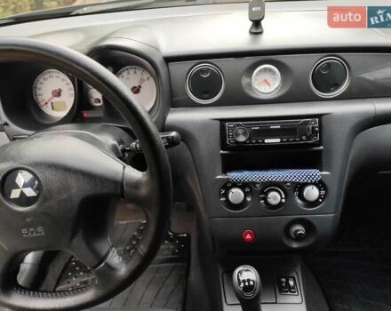 Черный Мицубиси Аутлендер, объемом двигателя 2 л и пробегом 180 тыс. км за 6000 $, фото 10 на Automoto.ua