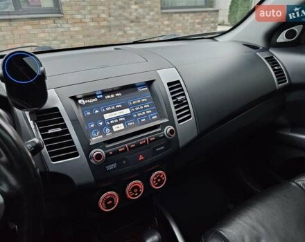 Черный Мицубиси Аутлендер, объемом двигателя 3 л и пробегом 238 тыс. км за 10800 $, фото 26 на Automoto.ua