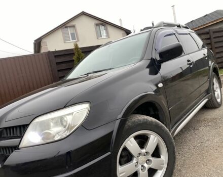 Черный Мицубиси Аутлендер, объемом двигателя 2.4 л и пробегом 178 тыс. км за 6900 $, фото 13 на Automoto.ua