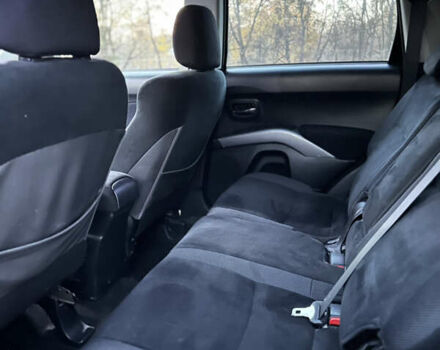 Чорний Міцубісі Аутлендер, об'ємом двигуна 1.97 л та пробігом 300 тис. км за 8600 $, фото 9 на Automoto.ua