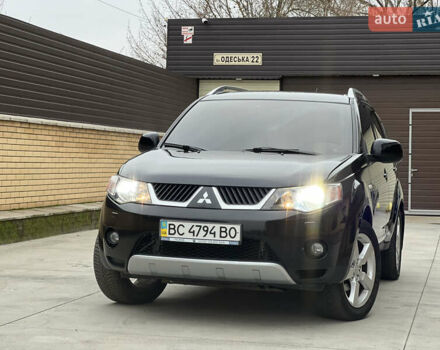 Чорний Міцубісі Аутлендер, об'ємом двигуна 2.4 л та пробігом 221 тис. км за 8900 $, фото 7 на Automoto.ua