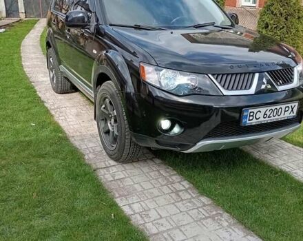 Черный Мицубиси Аутлендер, объемом двигателя 2.35 л и пробегом 245 тыс. км за 8000 $, фото 24 на Automoto.ua