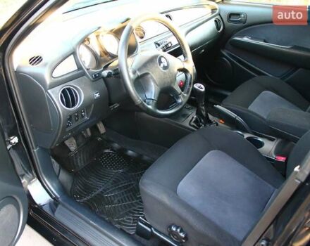 Черный Мицубиси Аутлендер, объемом двигателя 2 л и пробегом 190 тыс. км за 6900 $, фото 41 на Automoto.ua