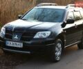 Черный Мицубиси Аутлендер, объемом двигателя 2 л и пробегом 190 тыс. км за 6900 $, фото 24 на Automoto.ua