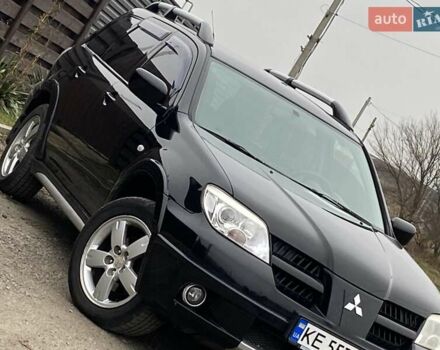 Черный Мицубиси Аутлендер, объемом двигателя 2.4 л и пробегом 178 тыс. км за 6900 $, фото 2 на Automoto.ua