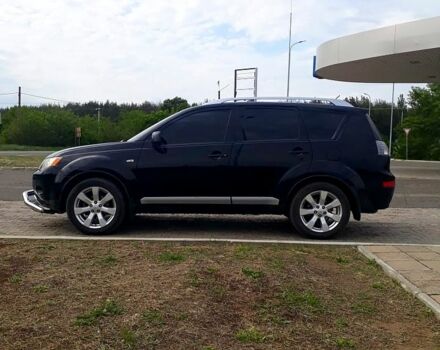 Черный Мицубиси Аутлендер, объемом двигателя 2.4 л и пробегом 180 тыс. км за 8900 $, фото 3 на Automoto.ua