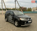 Мицубиси Аутлендер 2008 в Кременчуге на Automoto.ua Черный Мицубиси Аутлендер, объемом двигателя 2.4 л и пробегом 230 тыс. км за 6850 $, фото 16 на Automoto.ua