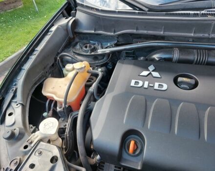 Черный Мицубиси Аутлендер, объемом двигателя 2 л и пробегом 249 тыс. км за 8750 $, фото 14 на Automoto.ua