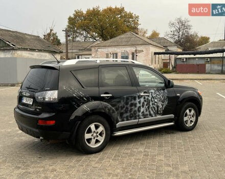 Черный Мицубиси Аутлендер, объемом двигателя 2.4 л и пробегом 230 тыс. км за 6650 $, фото 13 на Automoto.ua