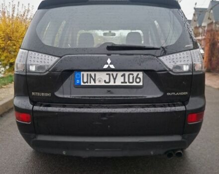 Черный Мицубиси Аутлендер, объемом двигателя 2 л и пробегом 226 тыс. км за 4700 $, фото 5 на Automoto.ua