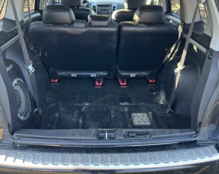 Черный Мицубиси Аутлендер, объемом двигателя 2 л и пробегом 247 тыс. км за 4600 $, фото 2 на Automoto.ua