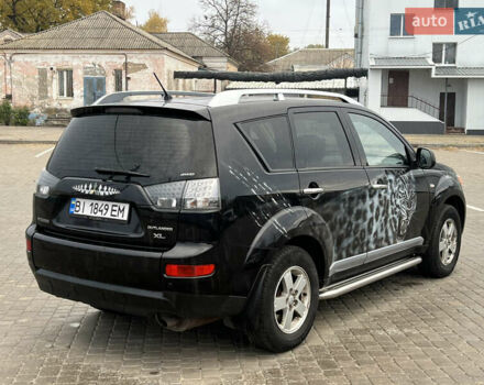 Мицубиси Аутлендер 2008 в Кременчуге на Automoto.ua Черный Мицубиси Аутлендер, объемом двигателя 2.4 л и пробегом 230 тыс. км за 6850 $, фото 23 на Automoto.ua