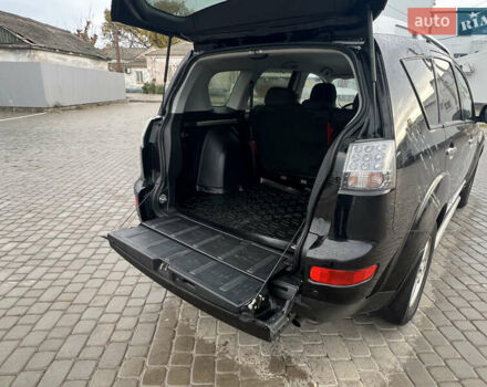 Міцубісі Аутлендер 2008 у Кременчуге на Automoto.ua Чорний Міцубісі Аутлендер, об'ємом двигуна 2.4 л та пробігом 230 тис. км за 6650 $, фото 55 на Automoto.ua