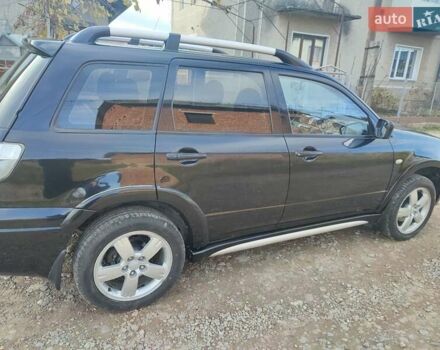 Міцубісі Аутлендер 2008 у Івано-Франківську на Automoto.ua Чорний Міцубісі Аутлендер, об'ємом двигуна 2 л та пробігом 128 тис. км за 7000 $, фото 14 на Automoto.ua