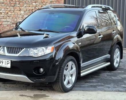 Чорний Міцубісі Аутлендер, об'ємом двигуна 2.4 л та пробігом 230 тис. км за 9700 $, фото 1 на Automoto.ua